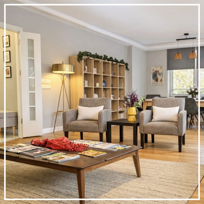 Young beautiful hipster woman sitting on the lake relaxing with